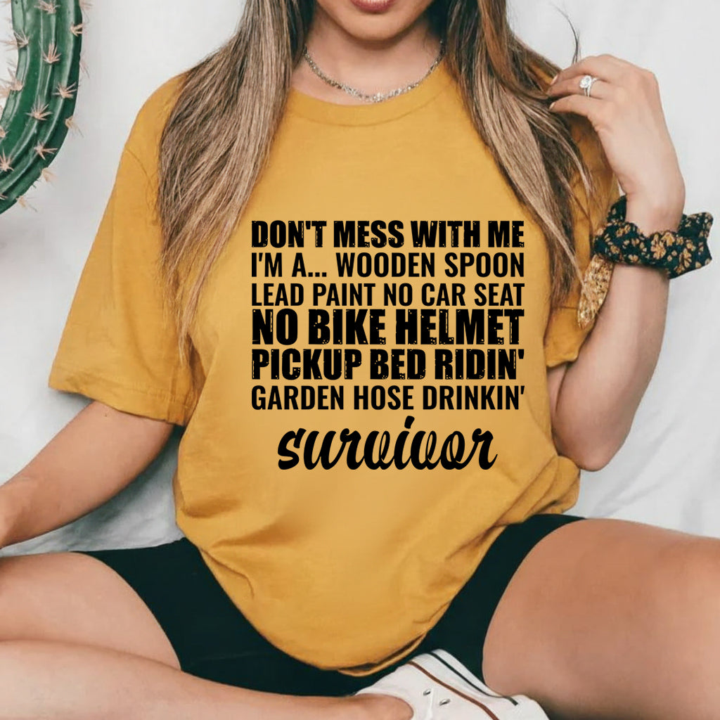 Don’t Mess With Me I’m a Wooden Spoon, Lead Paint, No Car Seat, No Bike Helmet, Pickup Bed Ridin’, Garden Hose Drinkin’ Survivor T-Shirt